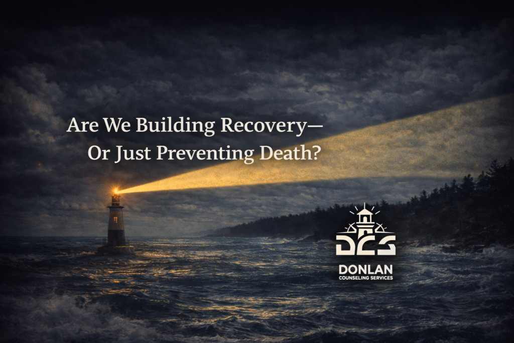 Lighthouse shining over a stormy ocean with text about declining overdose deaths and the need for long-term addiction recovery support, featuring Donlan Counseling Services logo.
